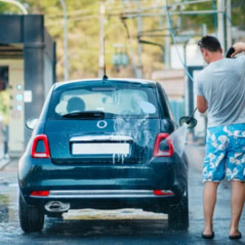 Guy is doing car washing HydroBlast Power Nozzle