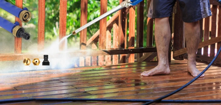 guy uses HydroBlast Power Nozzle for washing yard